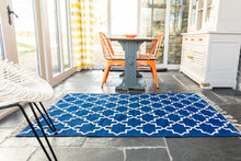 Load image into Gallery viewer, bright blue and white rug in dining room
