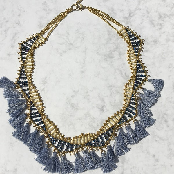 Blue bead and tassel necklace