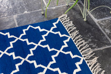 Load image into Gallery viewer, Bright Blue and white rug close up
